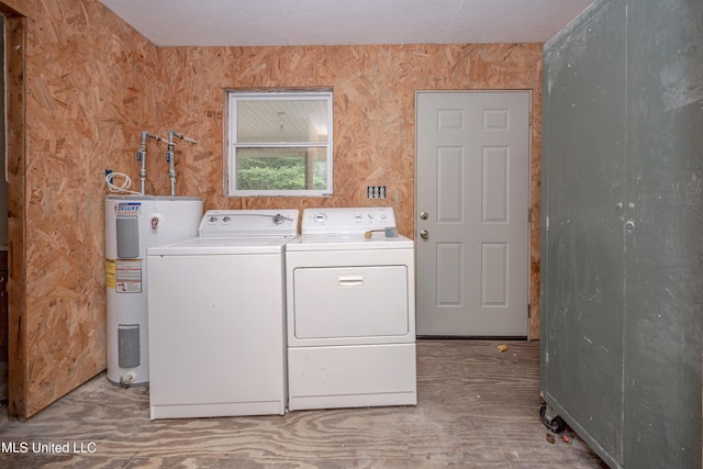 134 Lynne Ln, Lucedale, MS 39452 - washroom featuring electric water heater, washing machine and clothes dryer, and wood finished floors