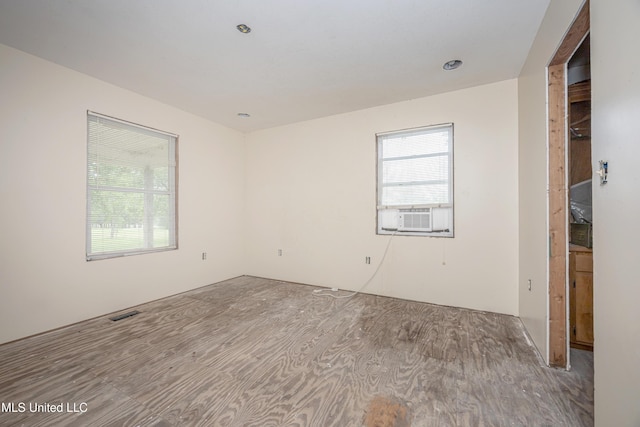 134 Lynne Ln, Lucedale, MS 39452 - empty room featuring cooling unit and wood finished floors