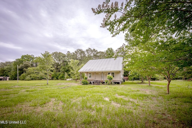 134 Lynne Ln, Lucedale, MS 39452 - view of green lawn featuring a wooden deck