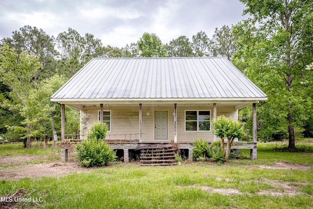 134 Lynne Ln, Lucedale, MS 39452 - view of front of house featuring covered porch and metal roof