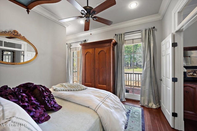 bedroom featuring dark hardwood / wood-style flooring, ornamental molding, access to exterior, and ceiling fan