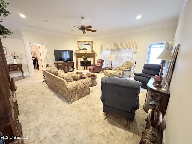 living room with carpet floors, recessed lighting, a ceiling fan, and crown molding