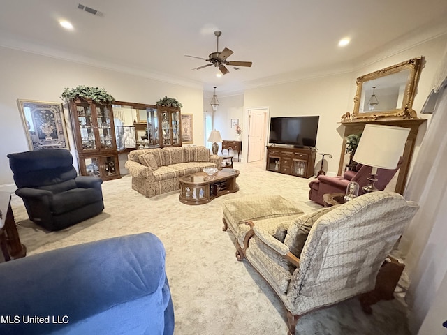 living area featuring carpet floors, ornamental molding, visible vents, and recessed lighting