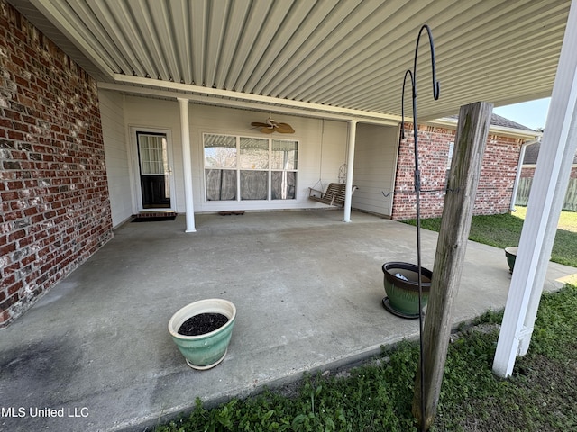 view of patio / terrace featuring an attached carport