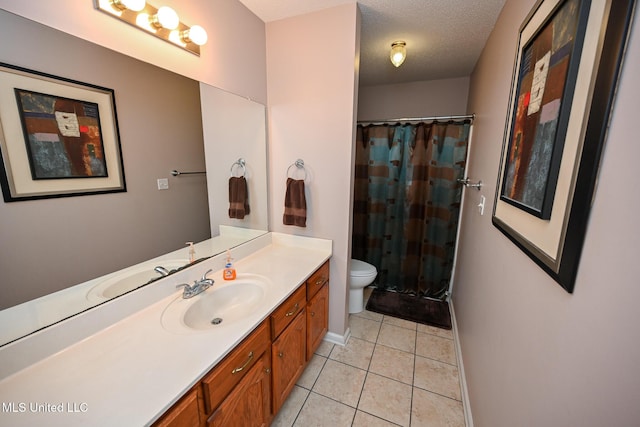 full bathroom featuring toilet, a shower with curtain, vanity, tile patterned floors, and baseboards