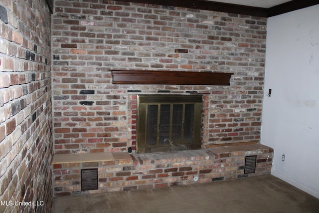7000 Melrose Dr, Biloxi, MS 39532 - detailed view of carpet floors, a brick fireplace, and baseboards