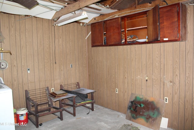 7000 Melrose Dr, Biloxi, MS 39532 - basement with wooden walls and washer / clothes dryer