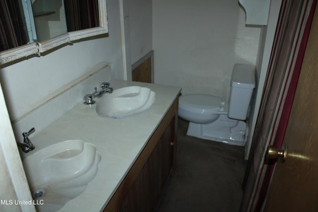 7000 Melrose Dr, Biloxi, MS 39532 - bathroom featuring toilet and double vanity