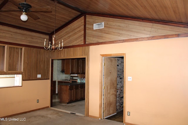 7000 Melrose Dr, Biloxi, MS 39532 - empty room featuring a chandelier, wood ceiling, a ceiling fan, baseboards, and carpet floors