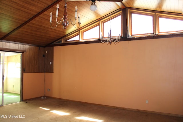 7000 Melrose Dr, Biloxi, MS 39532 - unfurnished room featuring a chandelier, vaulted ceiling, wood ceiling, and baseboards