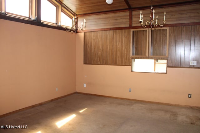 7000 Melrose Dr, Biloxi, MS 39532 - unfurnished room featuring a chandelier, wooden ceiling, baseboards, and carpet
