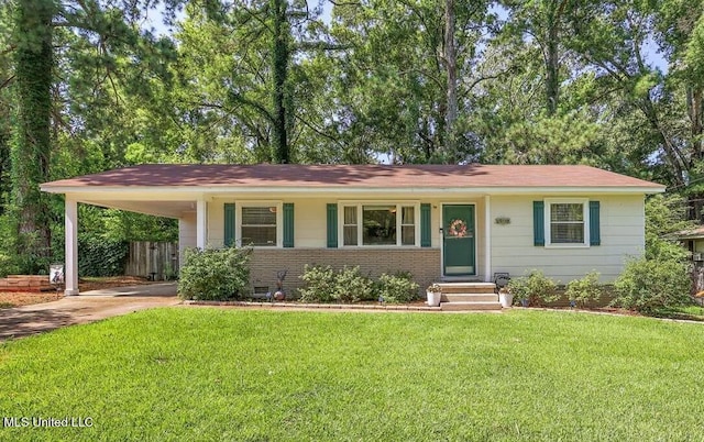 2709 Burma Dr, Pearl, MS 39208 - view of front of house featuring concrete driveway, a carport, and brick siding