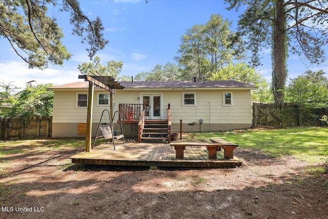2709 Burma Dr, Pearl, MS 39208 - rear view of house with a deck, a fenced backyard, and french doors