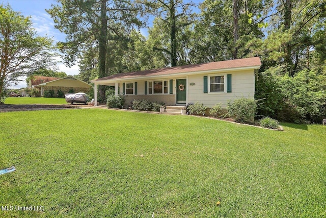 2709 Burma Dr, Pearl, MS 39208 - ranch-style house featuring a front lawn, dirt driveway, and a carport