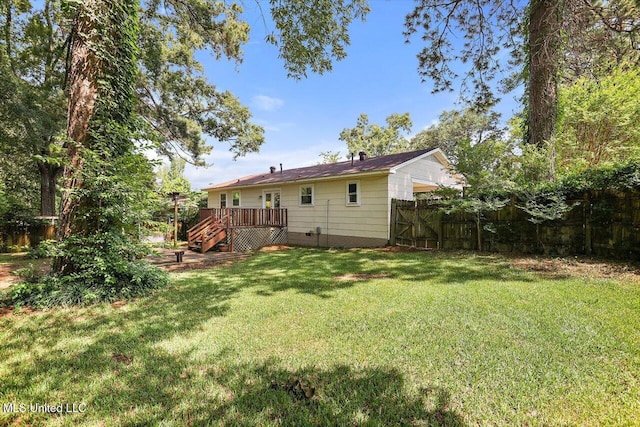 2709 Burma Dr, Pearl, MS 39208 - rear view of property featuring a wooden deck, a fenced backyard, stairway, and crawl space