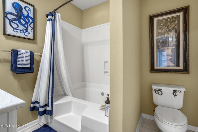 bathroom featuring toilet, shower / tub combo, and tile patterned floors