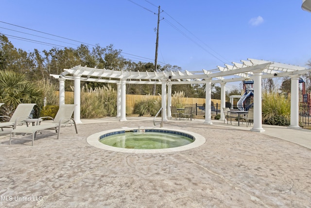 view of swimming pool featuring an in ground hot tub, a pergola, and a patio