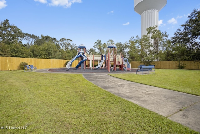 view of play area featuring a lawn