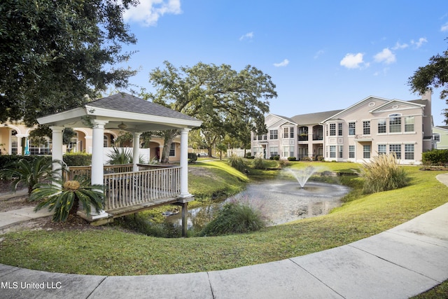 view of community with a gazebo and a yard