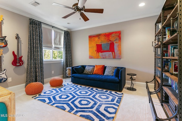 carpeted living room with crown molding and ceiling fan