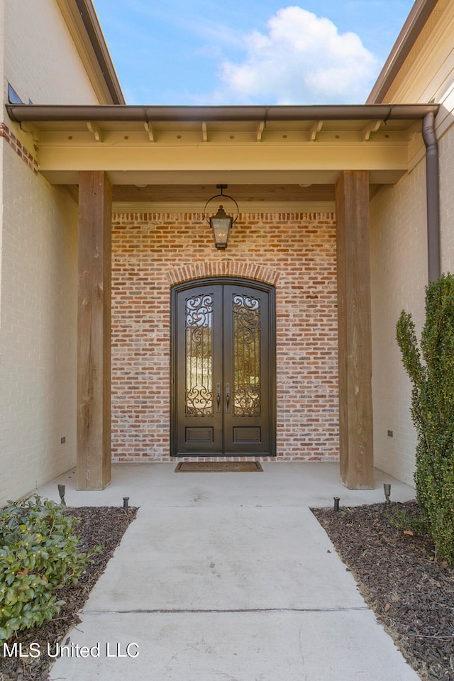 doorway to property with french doors