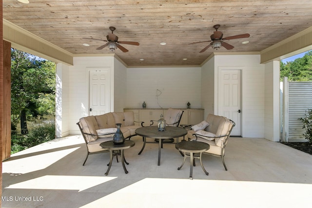 view of patio with ceiling fan and an outdoor hangout area