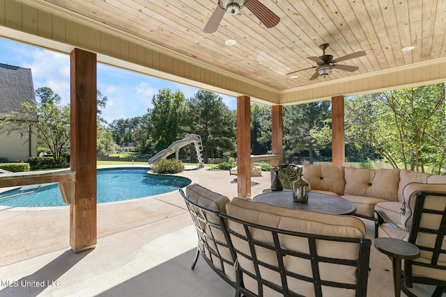 view of patio featuring ceiling fan