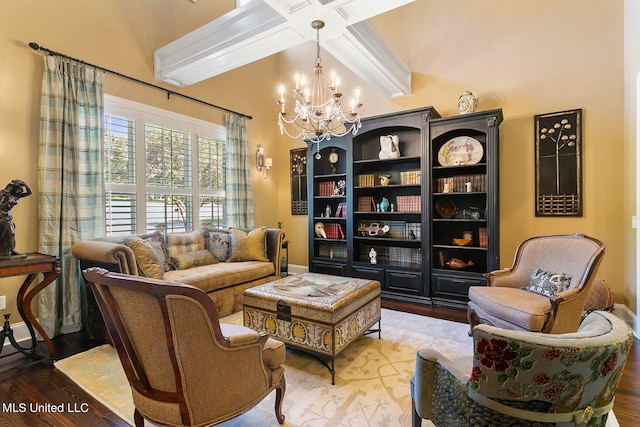 sitting room featuring coffered ceiling, a notable chandelier, hardwood / wood-style flooring, and beamed ceiling