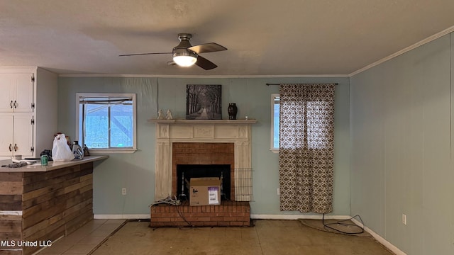 unfurnished living room featuring crown molding and ceiling fan