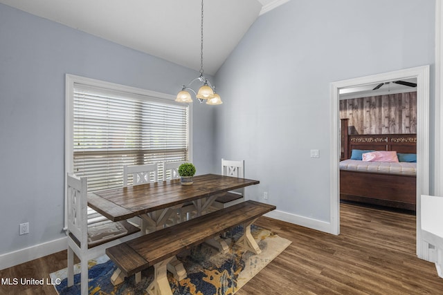 527 Pelahatchie Shore Dr, Brandon, MS 39047 - dining space with lofted ceiling, a chandelier, baseboards, dark wood-style floors, and ceiling fan