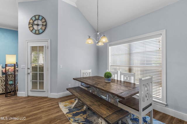 527 Pelahatchie Shore Dr, Brandon, MS 39047 - dining space featuring a chandelier, baseboards, wood finished floors, and vaulted ceiling