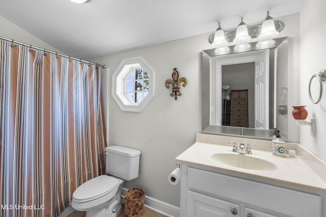 527 Pelahatchie Shore Dr, Brandon, MS 39047 - full bath featuring vanity, toilet, baseboards, lofted ceiling, and a shower with shower curtain