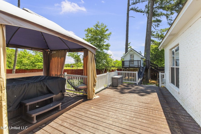 527 Pelahatchie Shore Dr, Brandon, MS 39047 - wooden deck featuring a gazebo