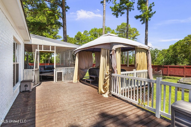 527 Pelahatchie Shore Dr, Brandon, MS 39047 - wooden terrace featuring a gazebo and a sunroom