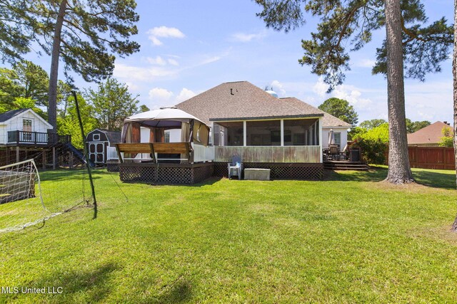 527 Pelahatchie Shore Dr, Brandon, MS 39047 - back of house featuring a sunroom, a wooden deck, a gazebo, and roof with shingles