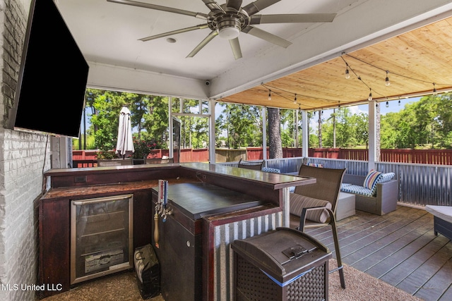 527 Pelahatchie Shore Dr, Brandon, MS 39047 - view of patio / terrace featuring a wooden deck, beverage cooler, area for grilling, ceiling fan, and a bar