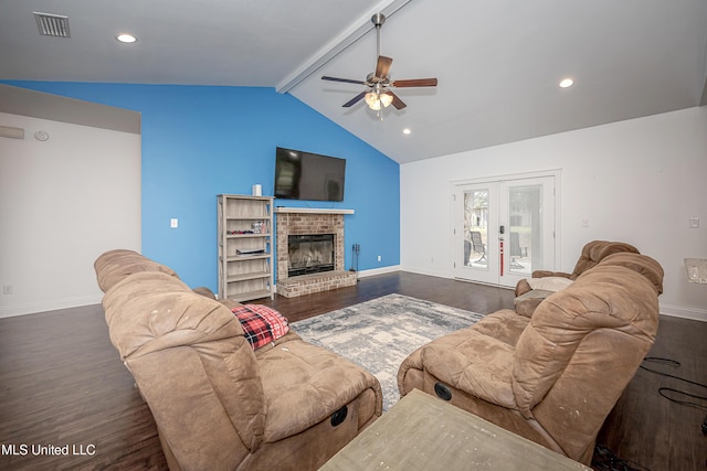 living area with lofted ceiling with beams, visible vents, dark wood-style floors, and a ceiling fan