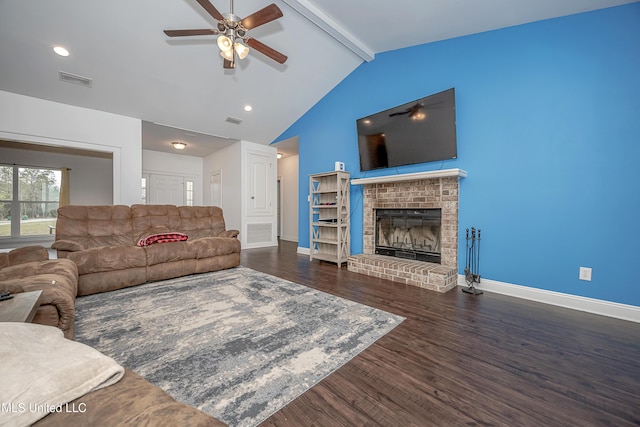 living room with visible vents, a ceiling fan, lofted ceiling with beams, wood finished floors, and baseboards