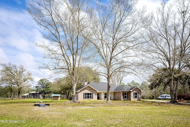 view of front of home with a front lawn