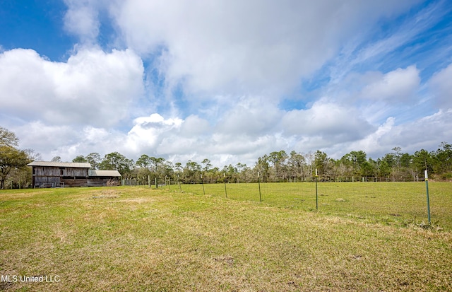 view of yard featuring a rural view