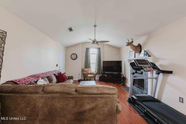 135 Eagle Dr, Brandon, MS 39047 - living room with wood finished floors, lofted ceiling, ceiling fan, and baseboards