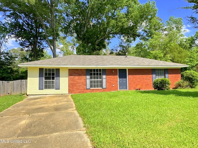 114 Leland St, Pearl, MS 39208 - single story home featuring fence, a shingled roof, a front lawn, and brick siding