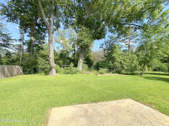 114 Leland St, Pearl, MS 39208 - view of yard with a patio and fence