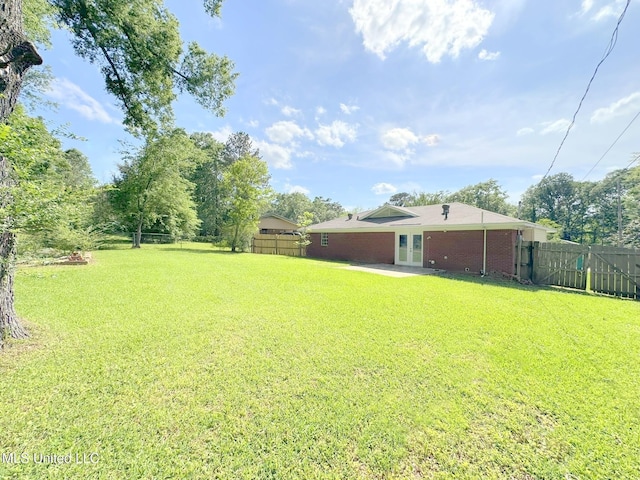 114 Leland St, Pearl, MS 39208 - view of yard with fence and french doors