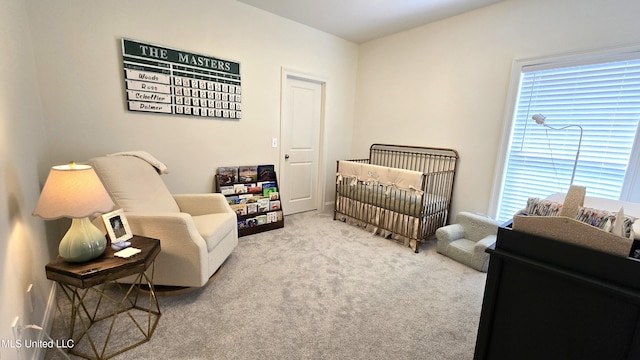 331 Emerald Way, Brandon, MS 39047 - bedroom with a crib, multiple windows, and carpet flooring