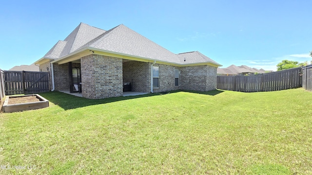 331 Emerald Way, Brandon, MS 39047 - rear view of house featuring brick siding and a shingled roof