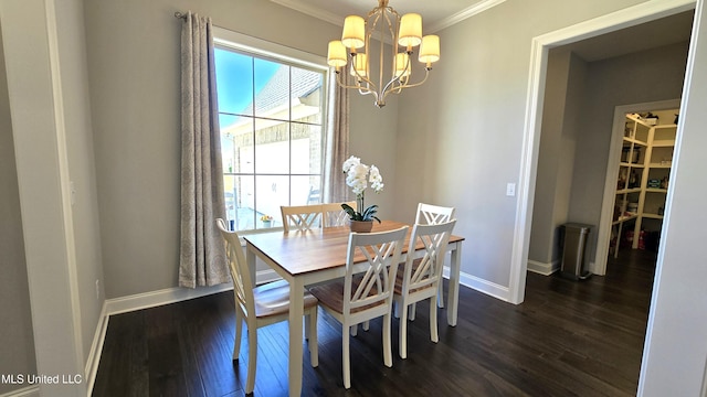 331 Emerald Way, Brandon, MS 39047 - dining space featuring a chandelier, baseboards, dark wood-type flooring, and crown molding
