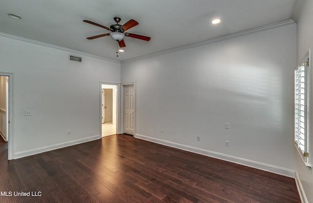 empty room featuring crown molding, ceiling fan, and dark hardwood / wood-style flooring