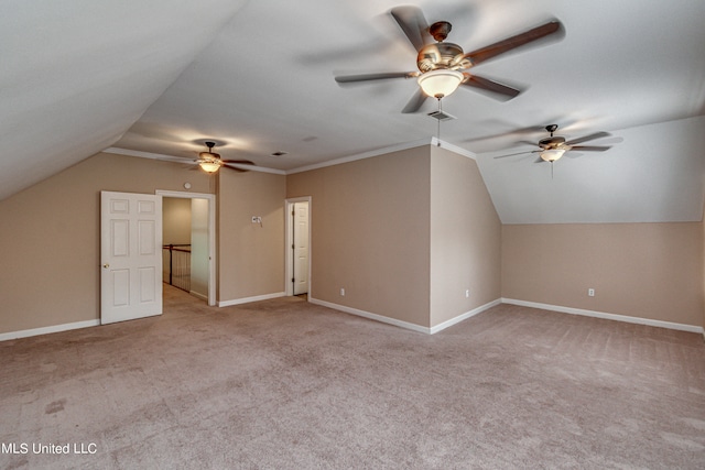 additional living space featuring light carpet, ceiling fan, and vaulted ceiling