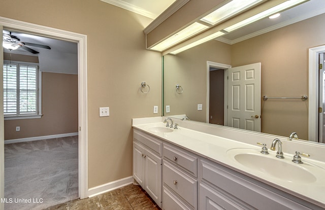 bathroom with vanity, ceiling fan, and ornamental molding